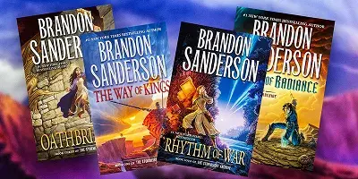 A stack of fantasy novels on a wooden table